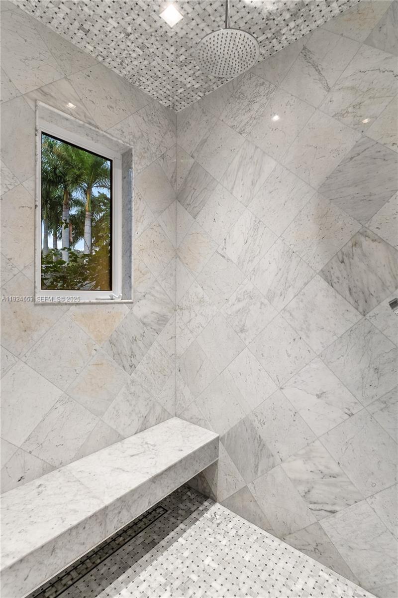 6080 Southwest 104th Street Pinecrest, FL 33156 - Photo 53 of 75 a bathroom with a window