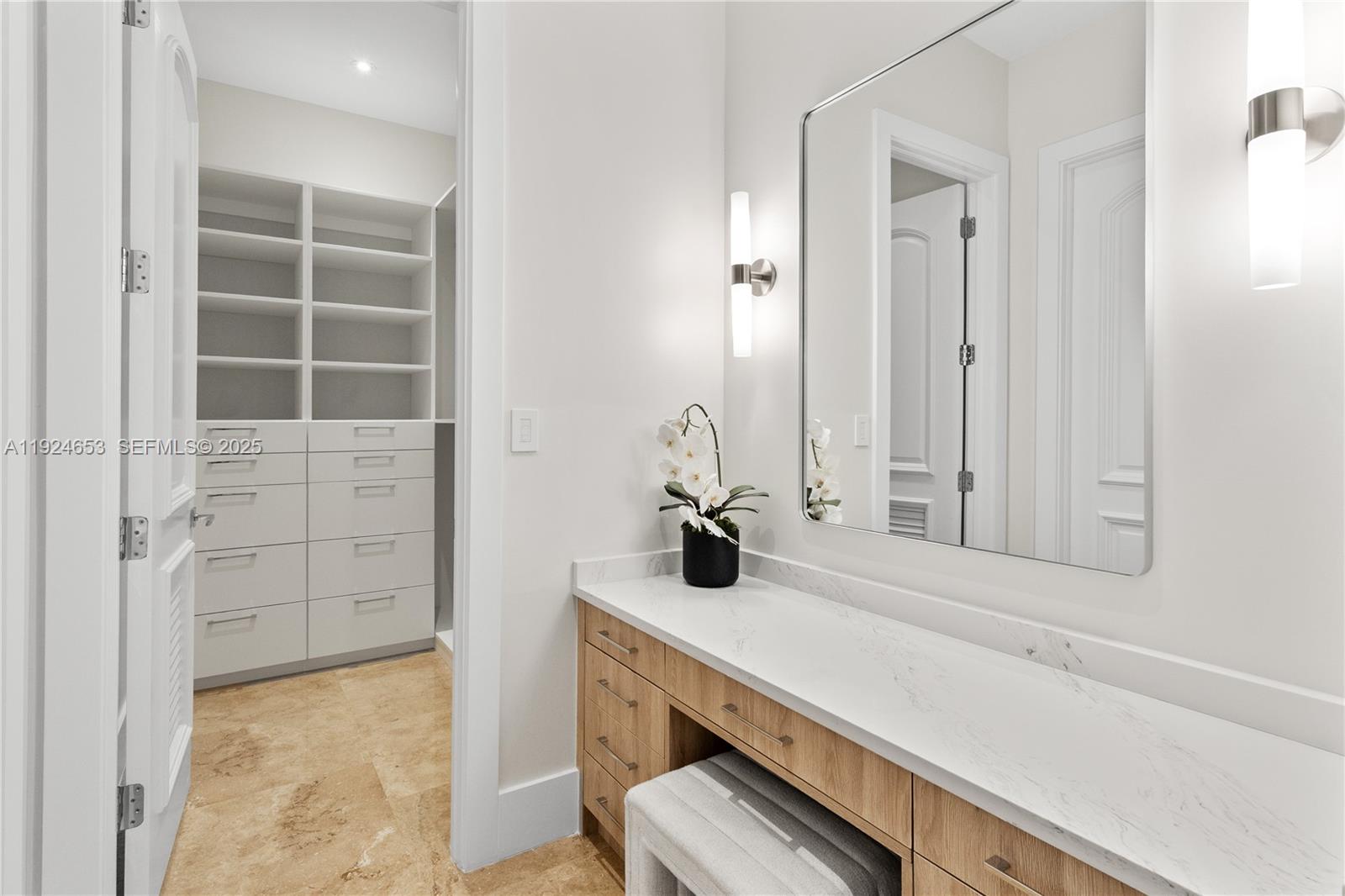 6080 Southwest 104th Street Pinecrest, FL 33156 - Photo 54 of 75 a bathroom with a sink and a mirror