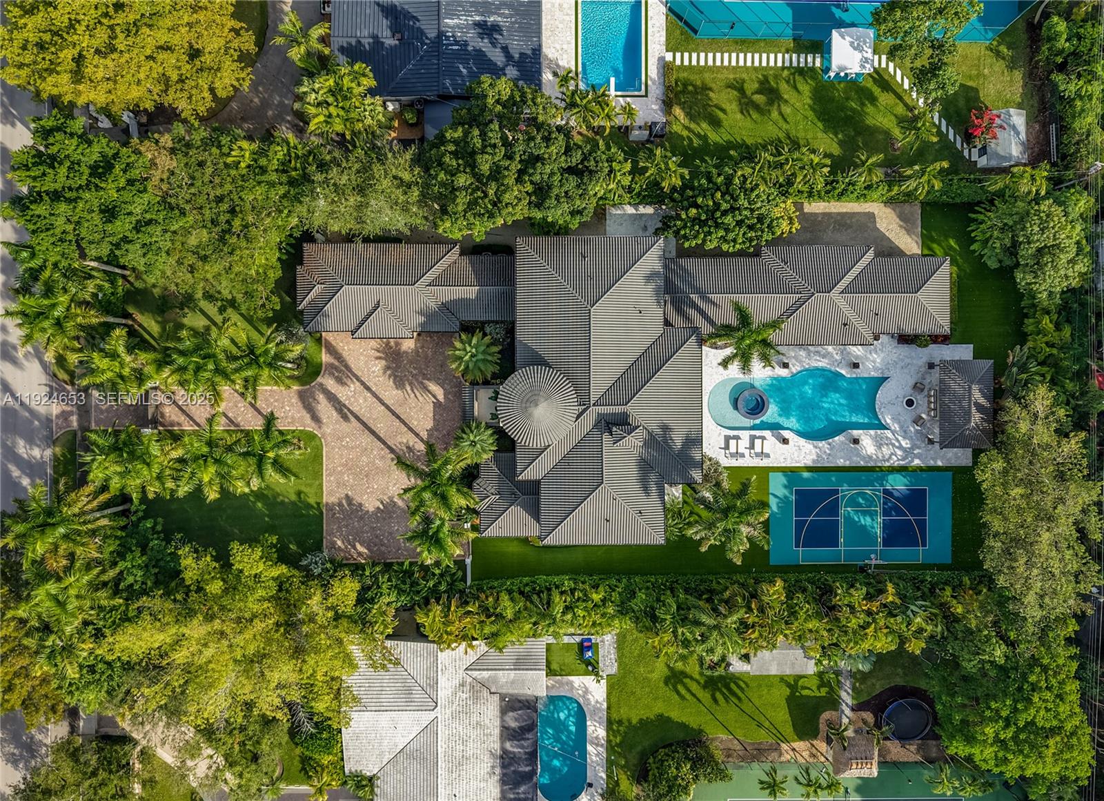 6080 Southwest 104th Street Pinecrest, FL 33156 - Photo 63 of 75 an aerial view of a house