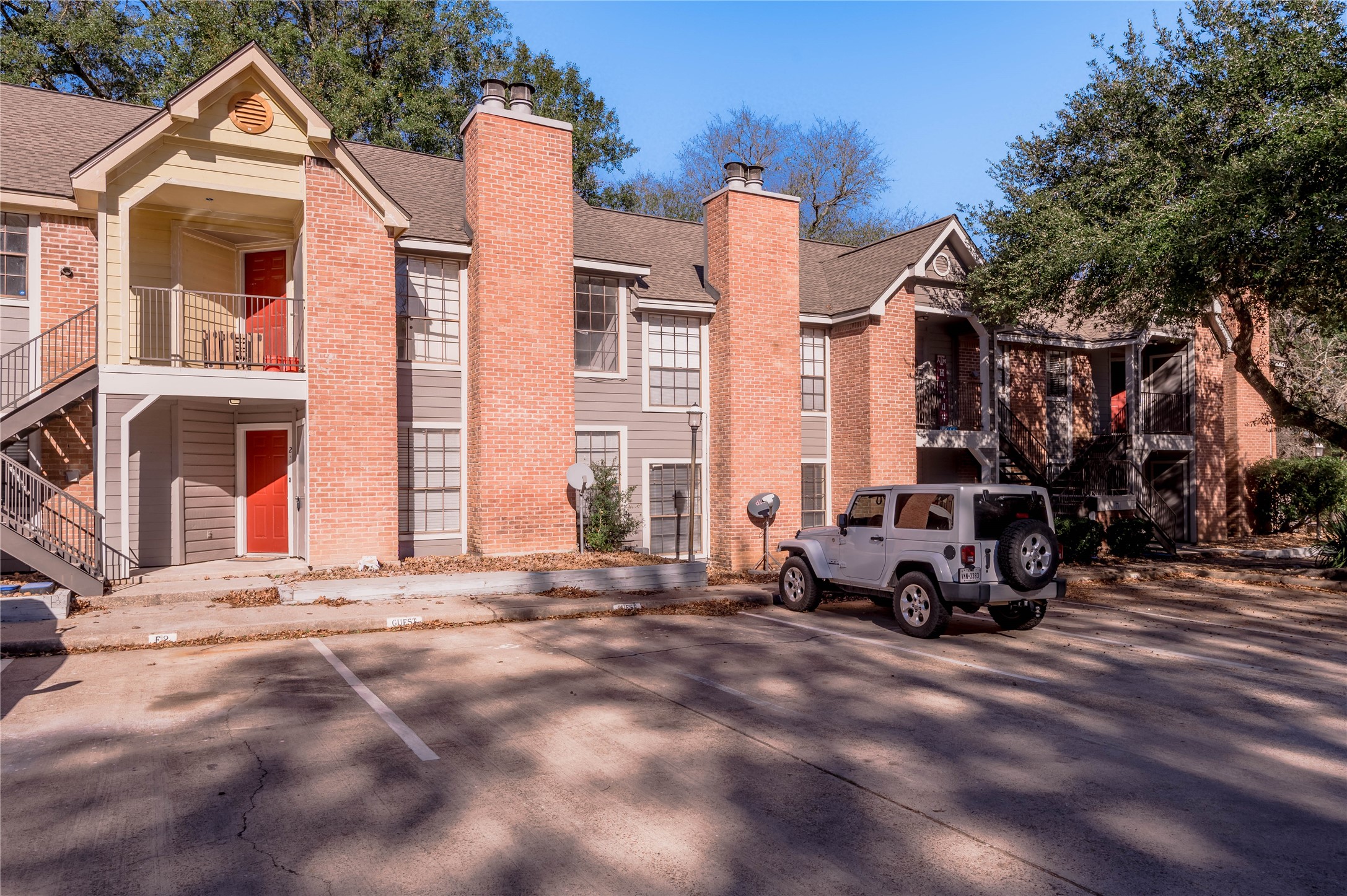 a car parked in front of a house