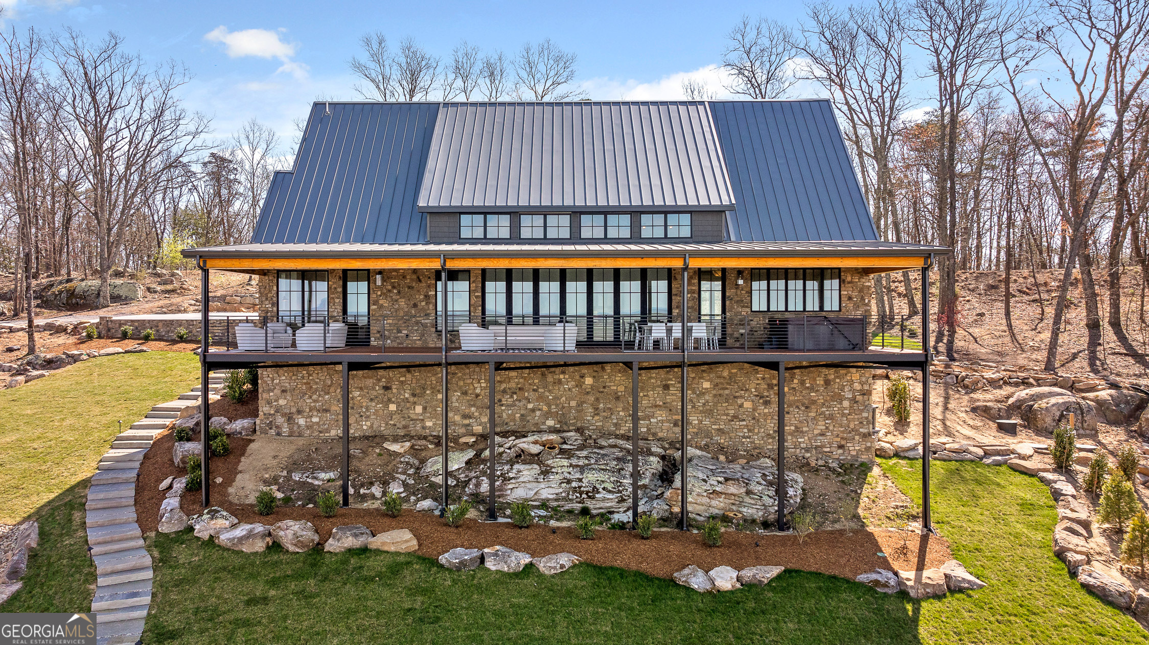 6565 Scenic Highway Rising Fawn, GA 30738 - Photo 1 of 47 a view of a large building with a swimming pool