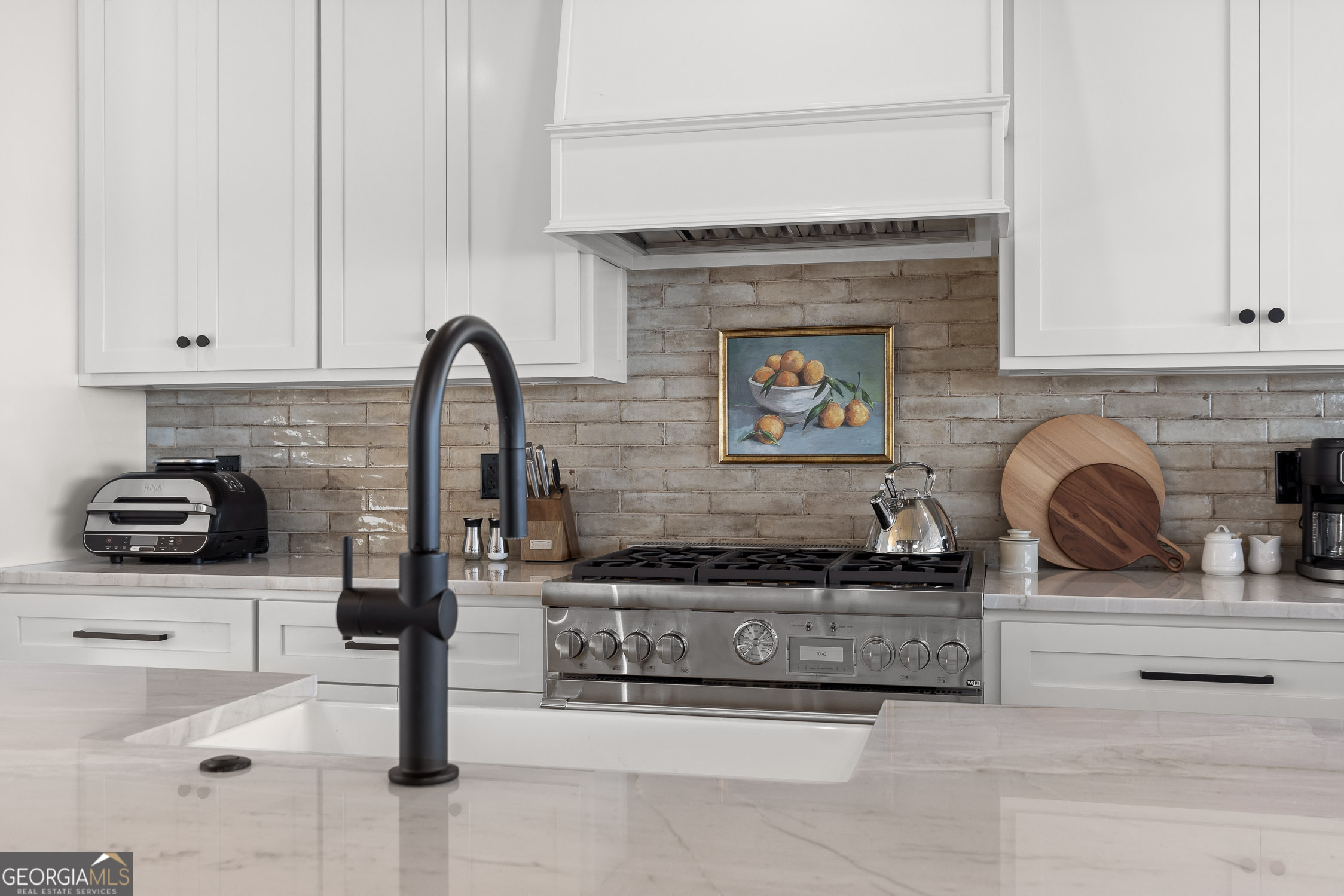 6565 Scenic Highway Rising Fawn, GA 30738 - Photo 11 of 47 a kitchen with stainless steel appliances granite countertop a stove and a cabinets