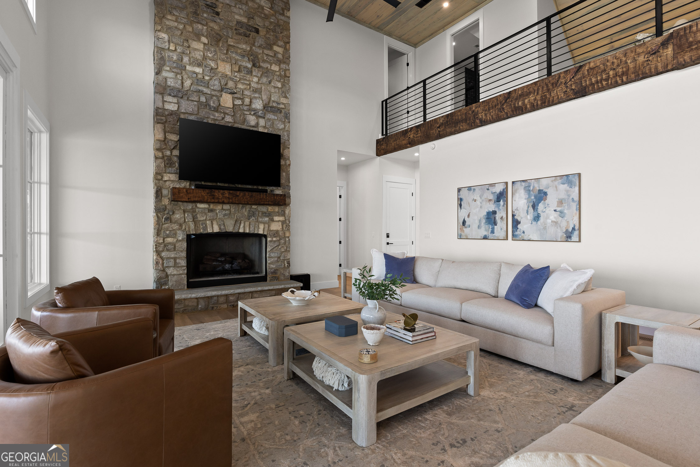 6565 Scenic Highway Rising Fawn, GA 30738 - Photo 4 of 47 a living room with furniture a flat screen tv and a fireplace