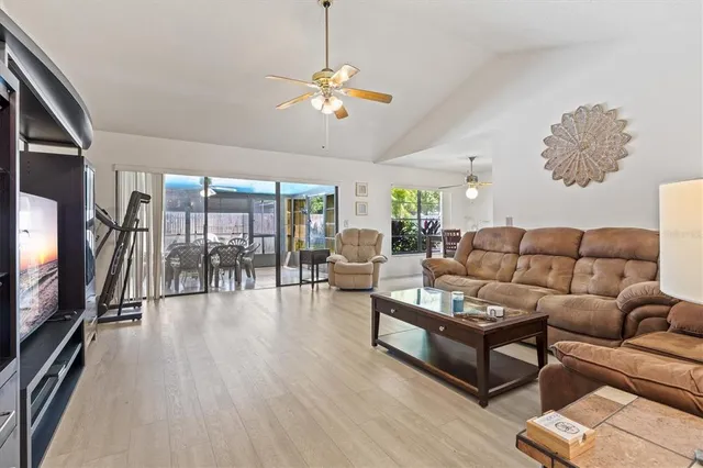 a kitchen with a sink cabinets and window
