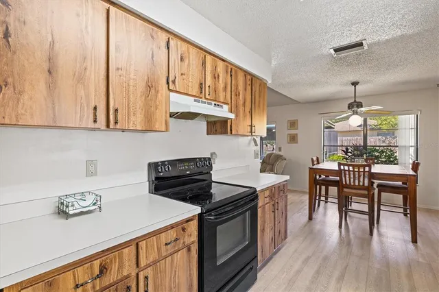 a bathroom with double vanity sinks and a large mirror