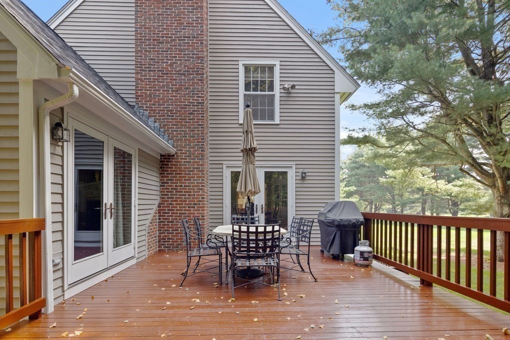 14 Wright Farm Concord, MA 01742 - Photo 14 of 34 a view of a chair and table in the balcony