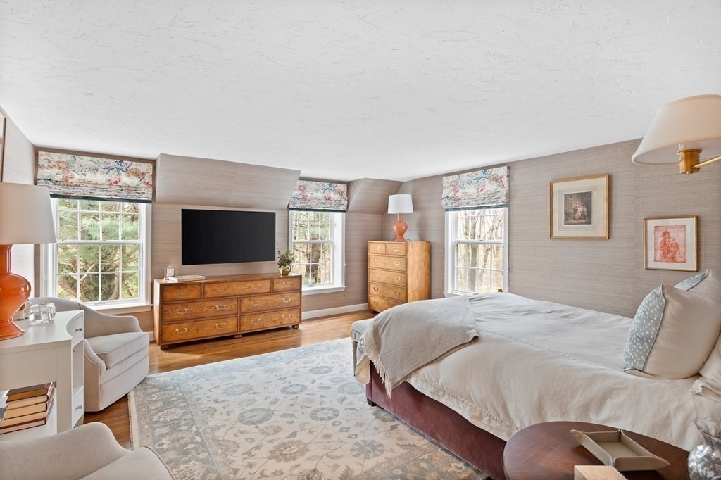 14 Wright Farm Concord, MA 01742 - Photo 18 of 34 a bedroom with a bed and glass window