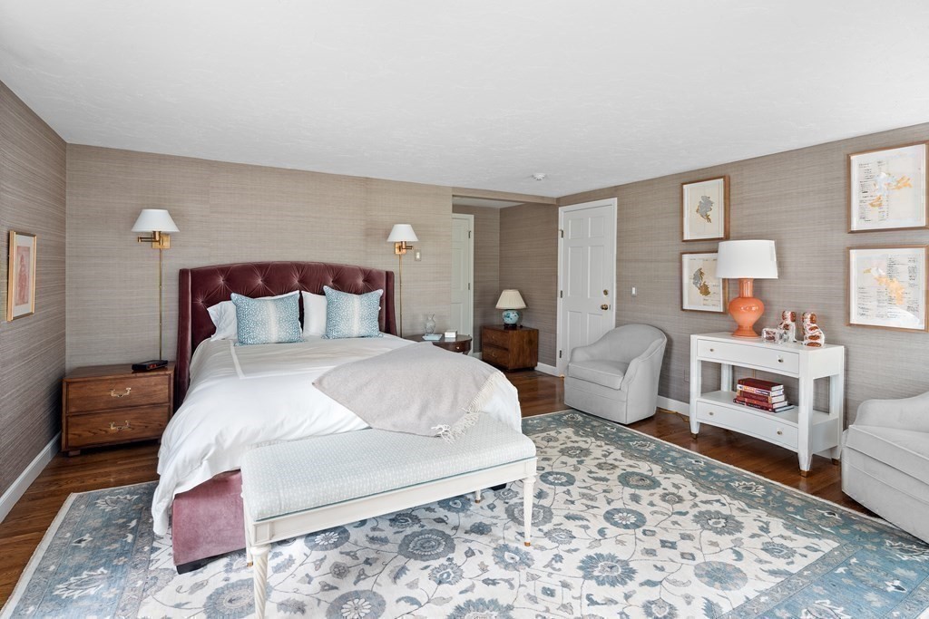 14 Wright Farm Concord, MA 01742 - Photo 20 of 34 a bedroom with a bed and wooden floor