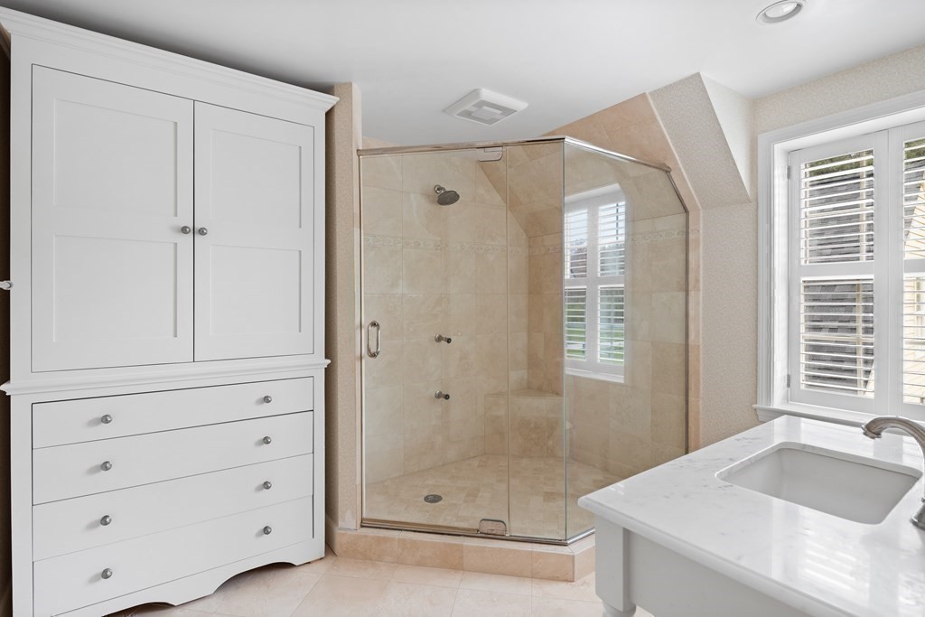 14 Wright Farm Concord, MA 01742 - Photo 21 of 34 a bathroom with a tub shower and sink