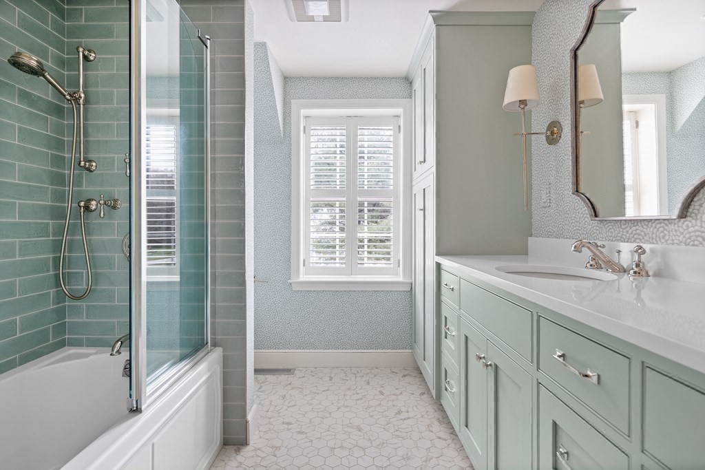 14 Wright Farm Concord, MA 01742 - Photo 23 of 34 a bathroom with a granite countertop sink a shower and a mirror