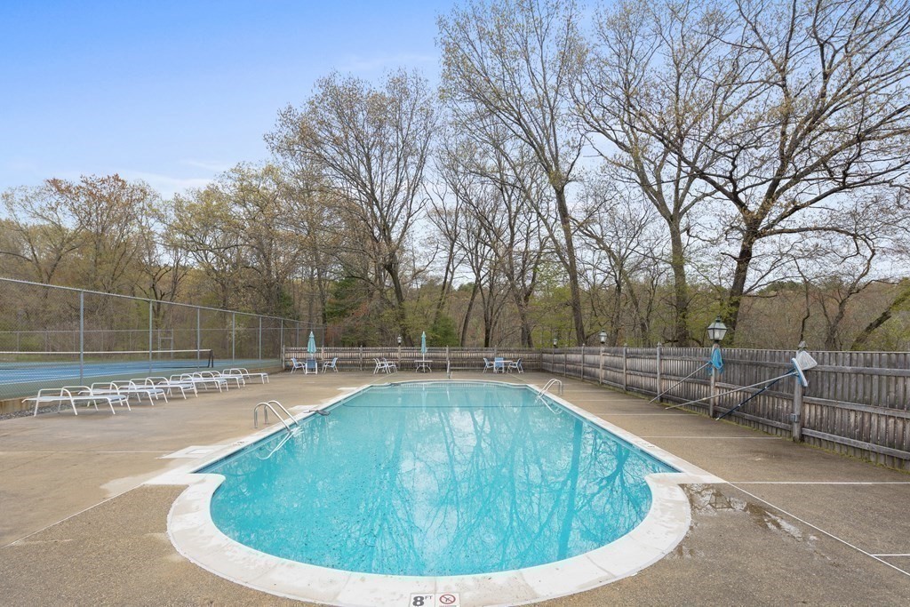 14 Wright Farm Concord, MA 01742 - Photo 29 of 34 a view of a swimming pool with a sitting space