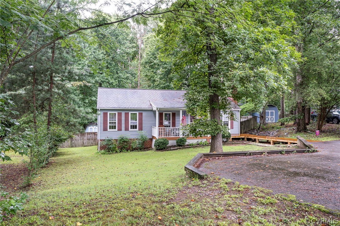 2806 Iverson Road Midlothian, VA 23112 - Photo 2 of 27 a view of a house with a yard and tree s