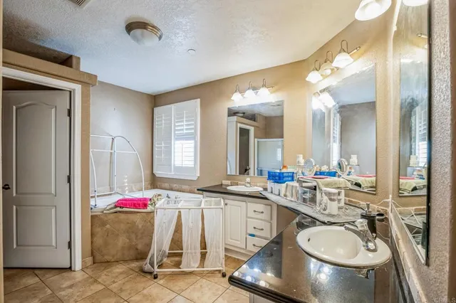a very nice looking kitchen with a large window
