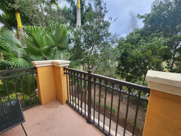 a wooden fence with trees in the background