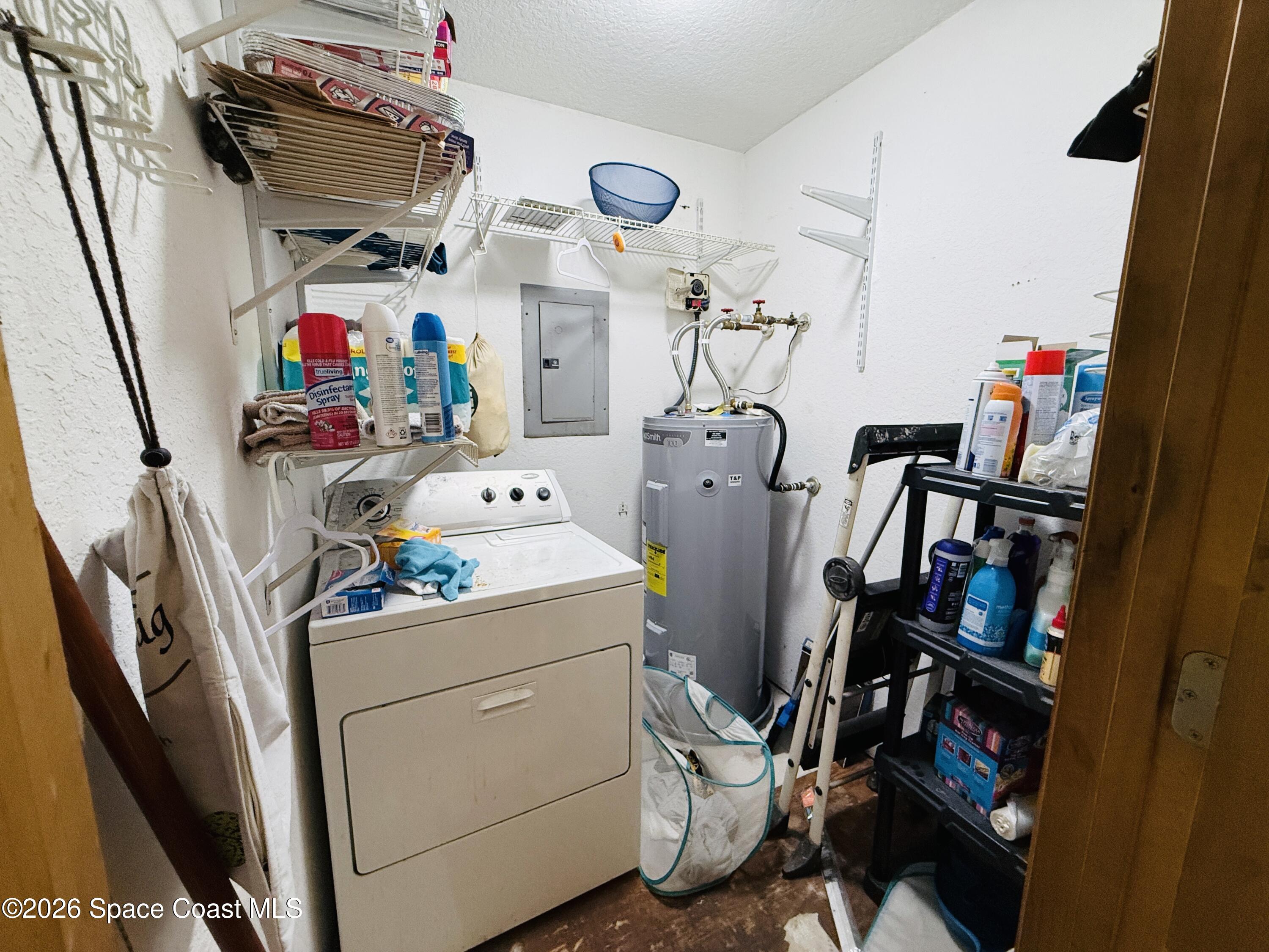 4590 Hog Valley Road Mims, FL 32754 - Photo 18 of 29 a storage room with washer and dryer