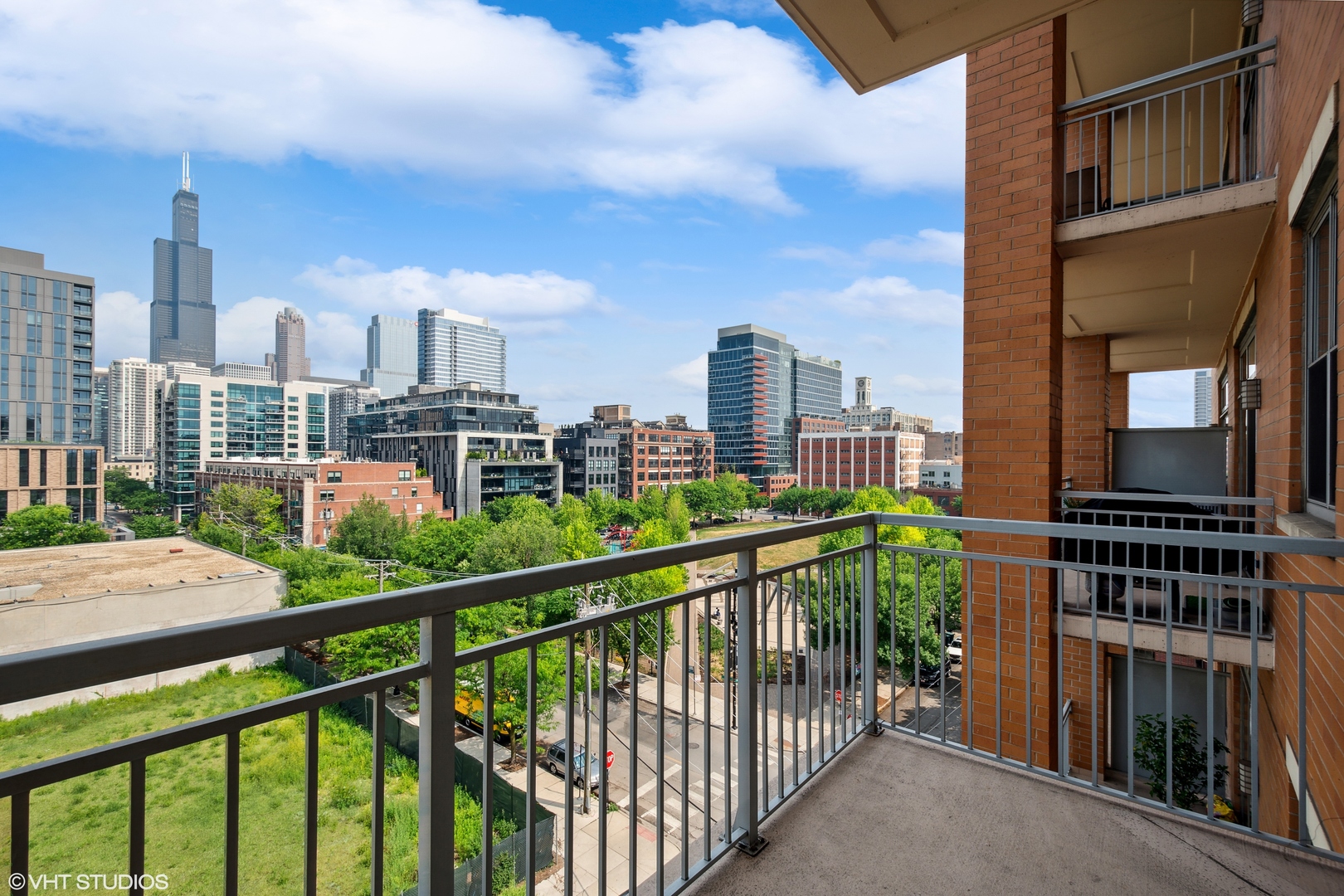 950 West Monroe Street, Unit 602 Chicago, IL 60607 - Photo 11 of 14 a view of a city from a balcony