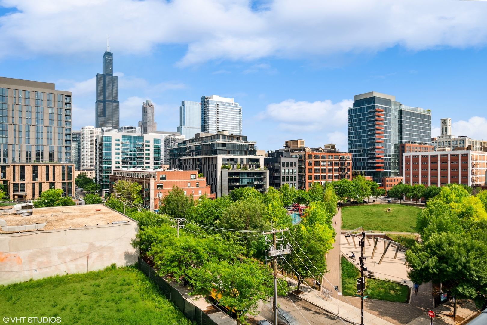 950 West Monroe Street, Unit 602 Chicago, IL 60607 - Photo 12 of 14 a view of a city with tall buildings