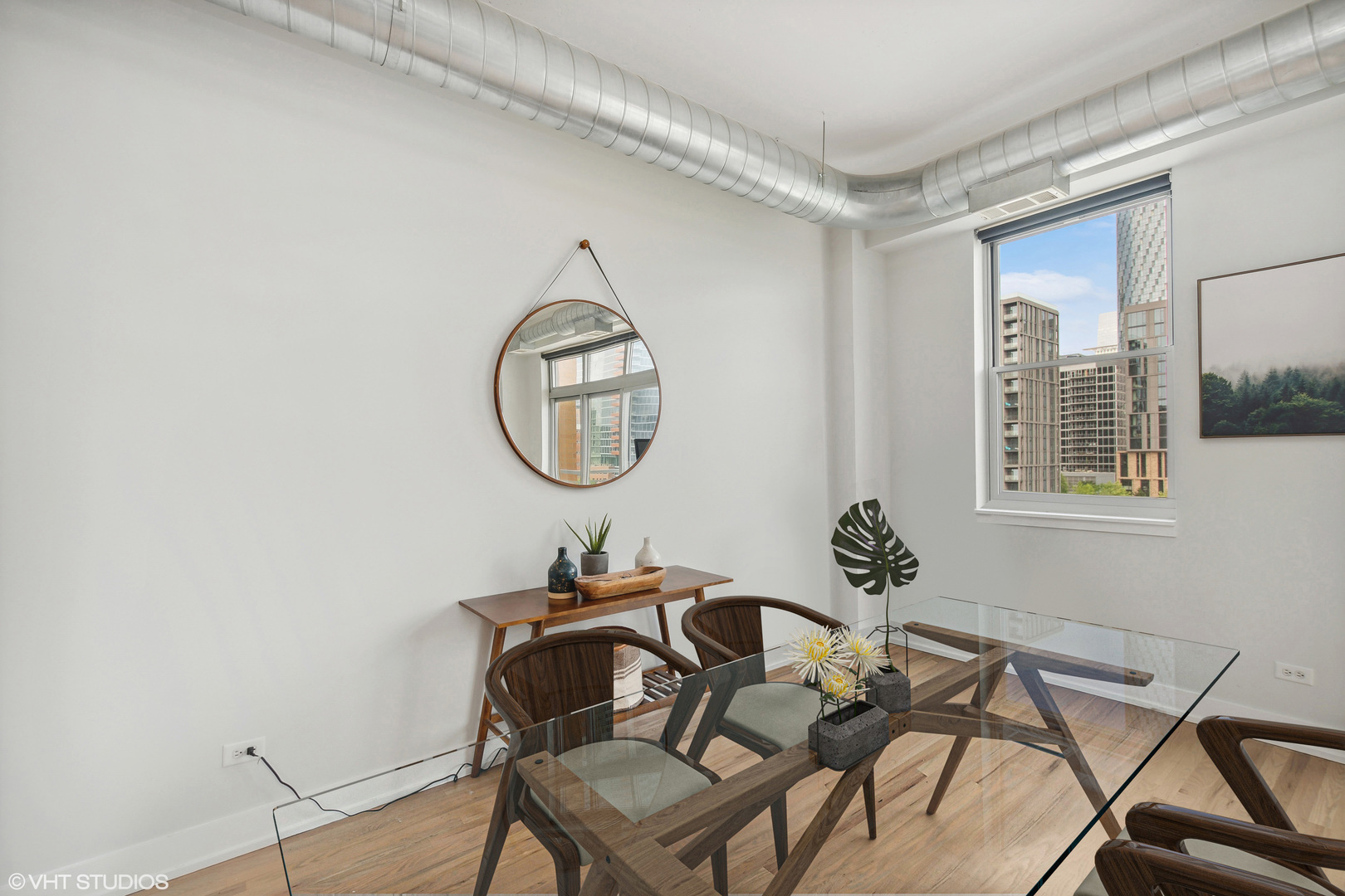 950 West Monroe Street, Unit 602 Chicago, IL 60607 - Photo 8 of 14 a view of a livingroom with furniture and mirror