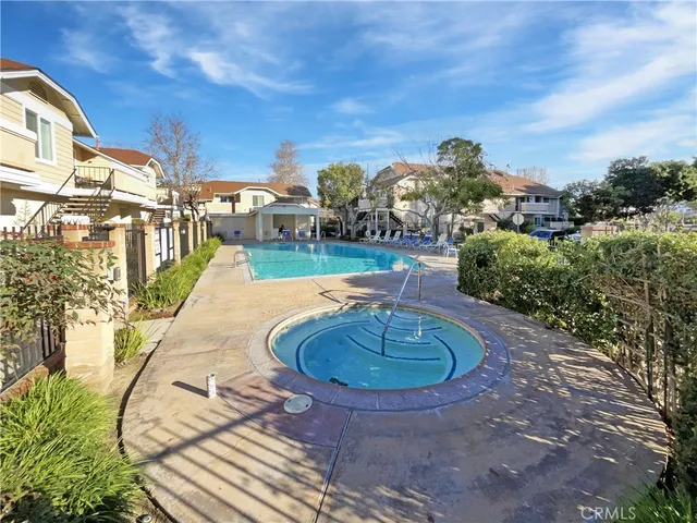 a view of parking area with parked cars