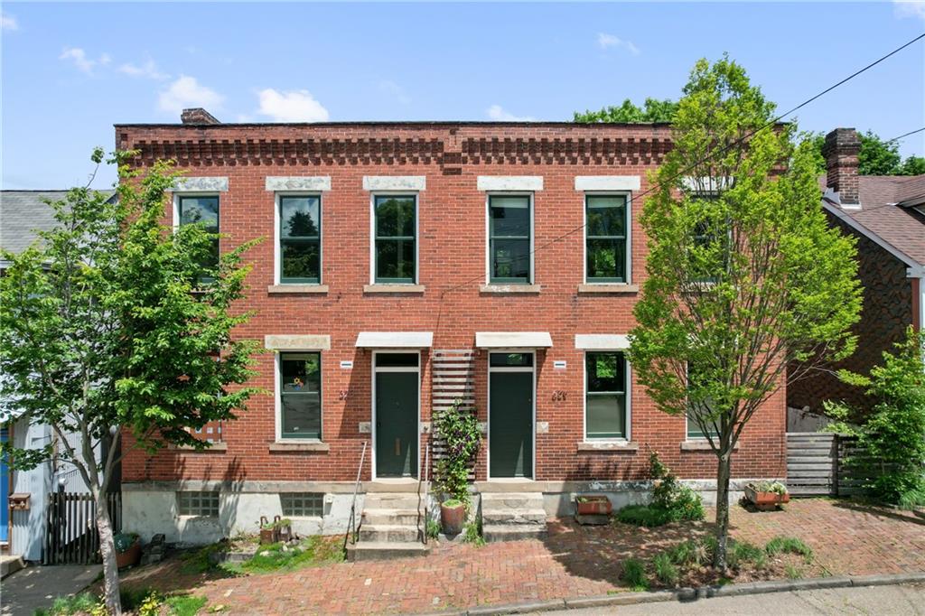 328 Harmar Street Pittsburgh, PA 15219 - Photo 1 of 1 front view of house with a street