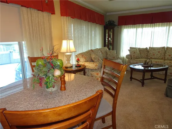 a kitchen with a sink cabinets and window
