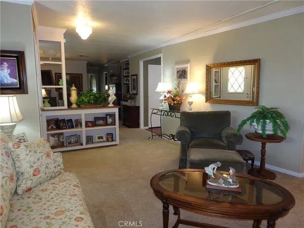 a kitchen with stainless steel appliances granite countertop a refrigerator and cabinets