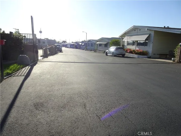 a room with a washing machine and a fireplace