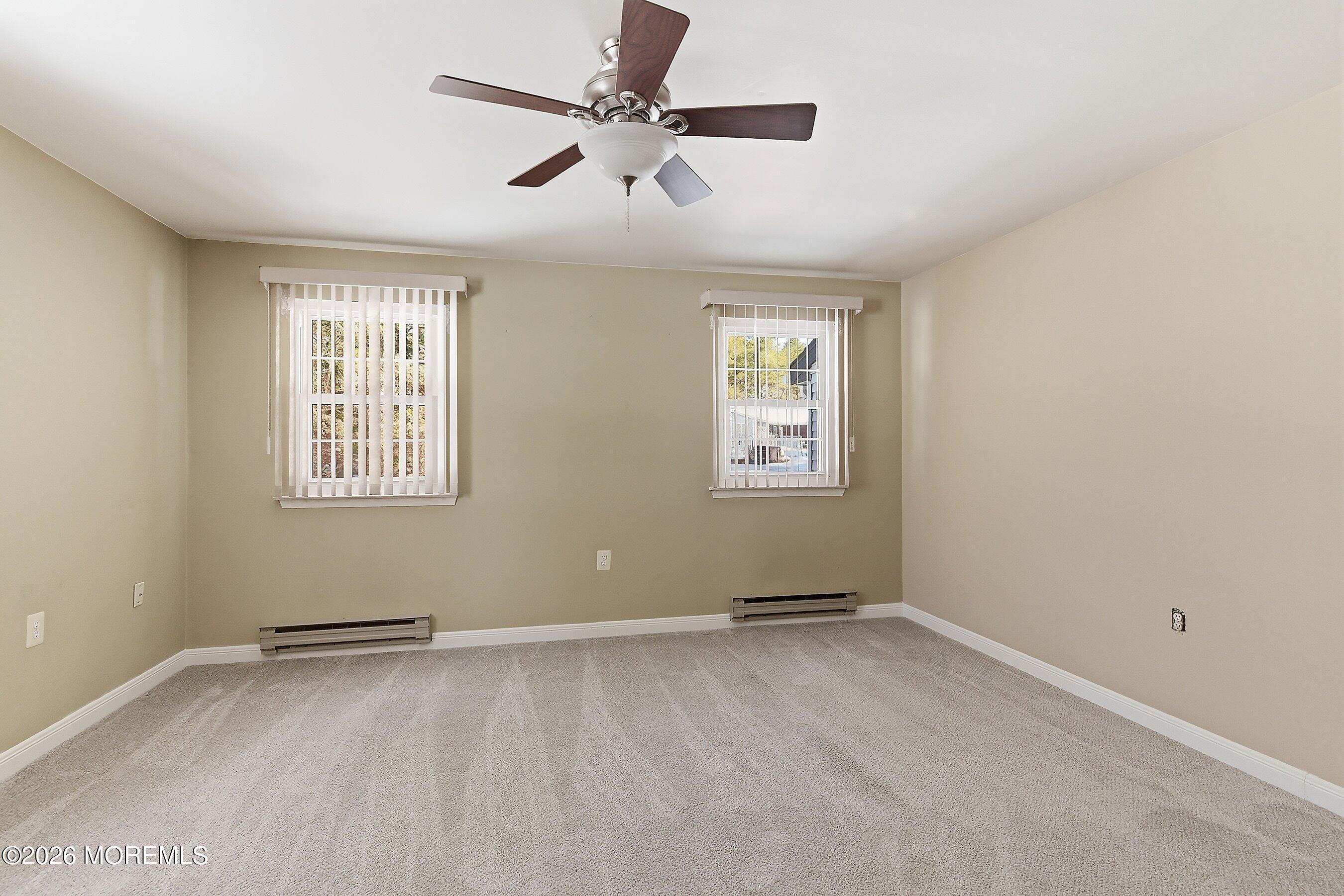 14 Medford Road, Unit 61 Whiting, NJ 08759 - Photo 14 of 36 a view of an empty room with a window