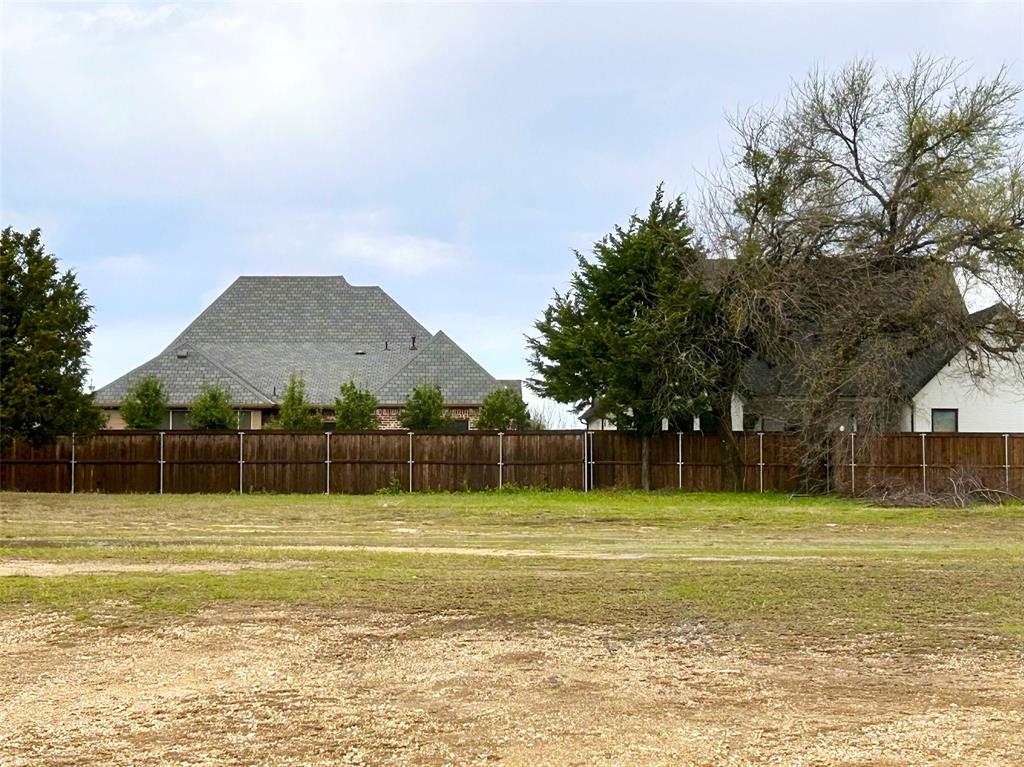 2221 Key Way Midlothian, TX 76065 - Photo 1 of 3 a view of a swimming pool with an outdoor space and seating area