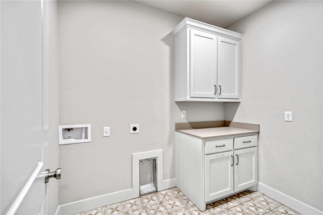 2815 Spector Drive Bryan, TX 77808 - Photo 13 of 15 a kitchen with cabinets and appliances