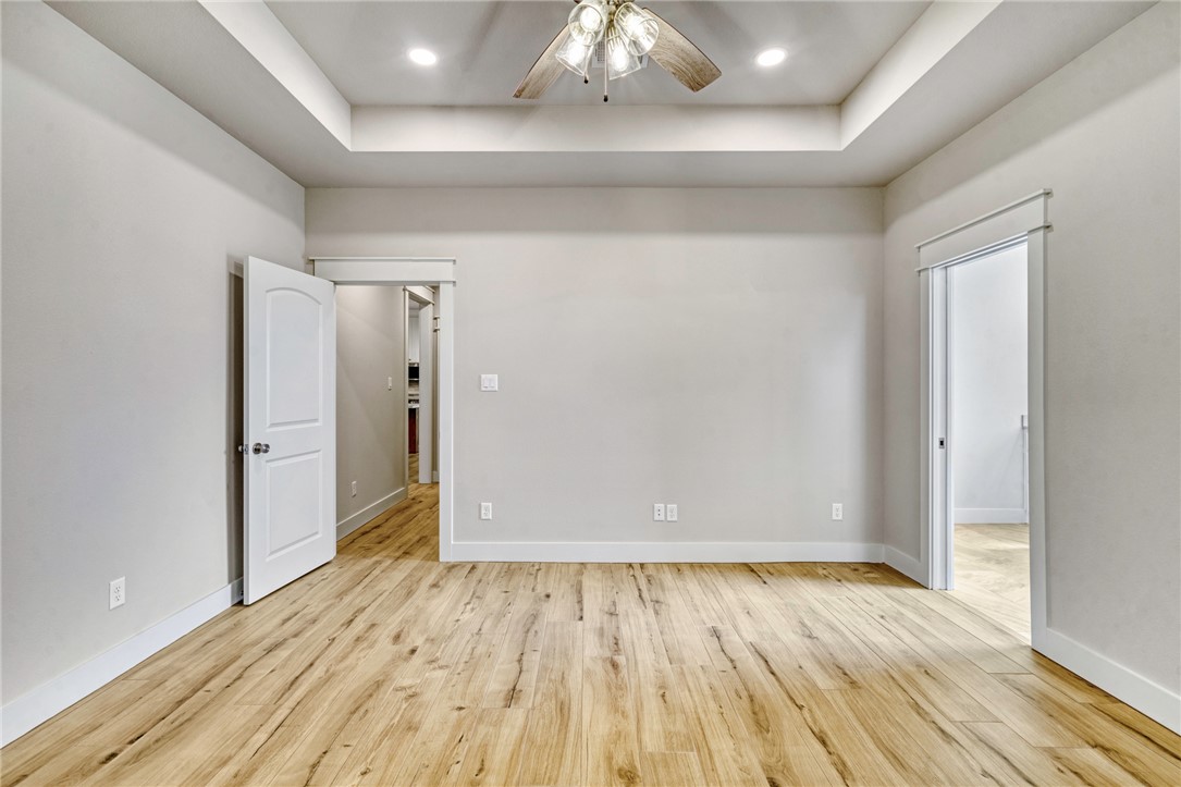 2815 Spector Drive Bryan, TX 77808 - Photo 6 of 15 a view of an empty room and wooden floor