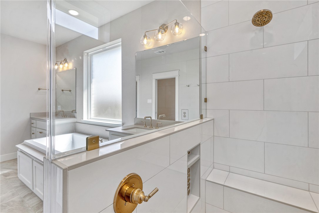 2815 Spector Drive Bryan, TX 77808 - Photo 8 of 15 a bathroom with a sink and a mirror