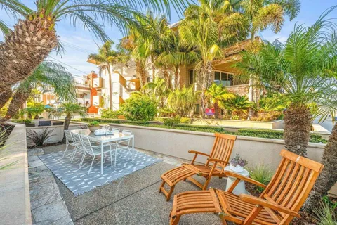 swimming pool view from a patio with swimming pool