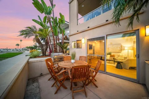 a dining room with furniture and a garden