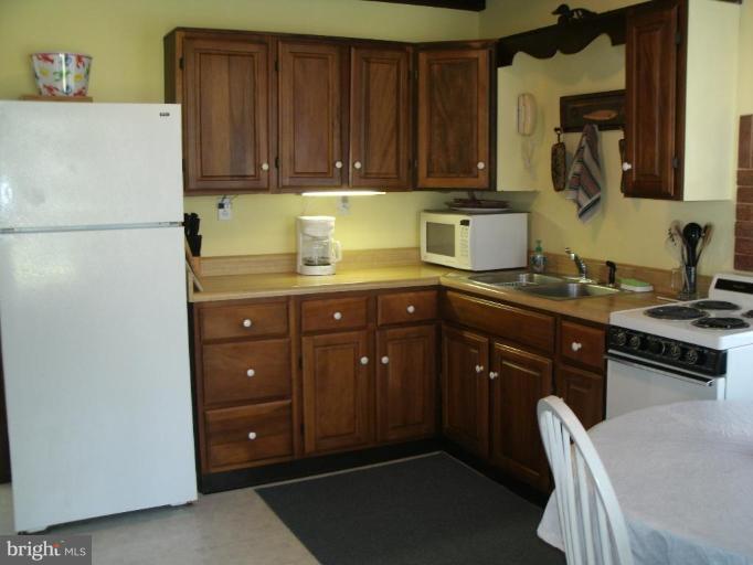 5791 Beach Road Rock Hall, MD 21661 - Photo 8 of 15 Modern kitchen with newer cabinets and appliances