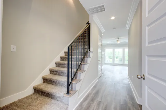 a view of entryway with wooden floor