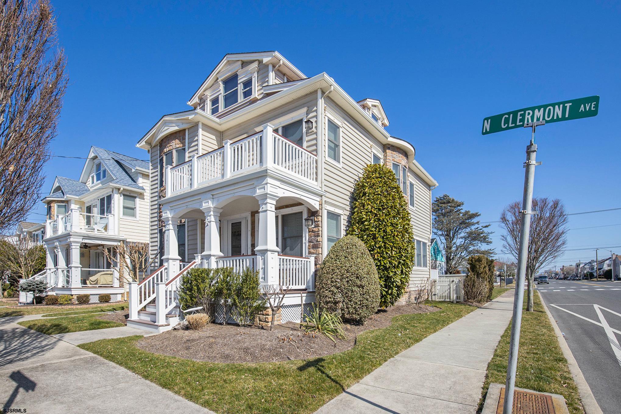 7611 Ventnor Avenue, Unit JUNE 2026 Margate City, NJ 08402 - Photo 2 of 49 a front view of a house with a yard