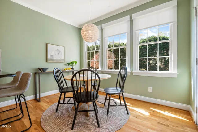 a bedroom with bed and a window