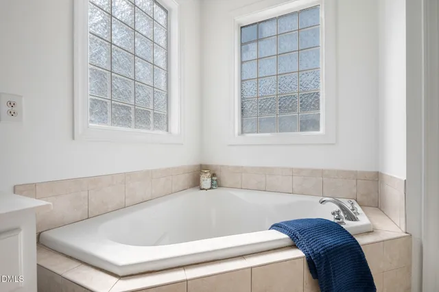 a utility room with sink dryer and washer