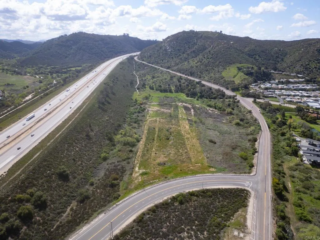3309 San Rey Bonsall, CA 92003 - Photo 11 of 16 a view of a yard in front of a house