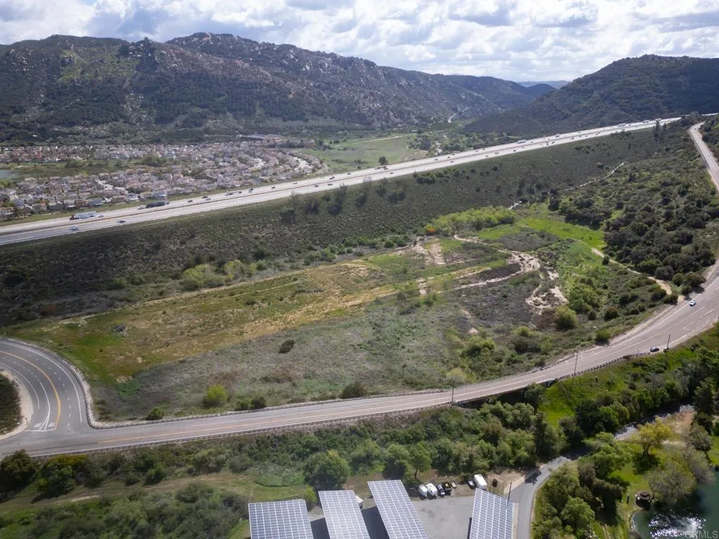 3309 San Rey Bonsall, CA 92003 - Photo 13 of 16 a view of a yard with wooden fence