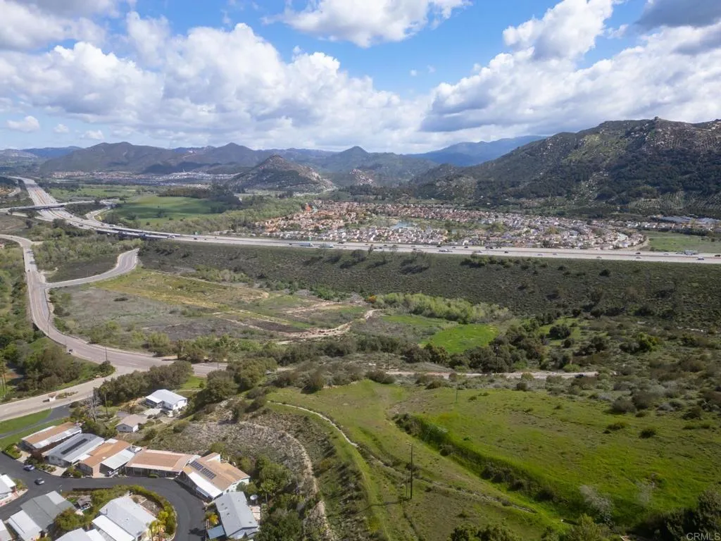 3309 San Rey Bonsall, CA 92003 - Photo 4 of 16 a view of lake with mountain