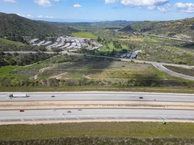 a view of a yard in front of a house
