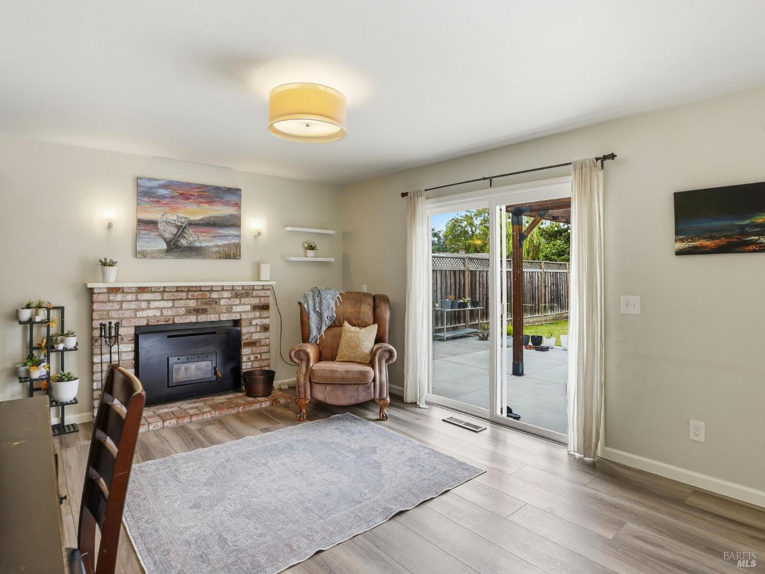 2787 Royal Oak Place Santa Rosa, CA 95403 - Photo 10 of 37 Sliders off family room lead to the outdoor entertaining area with stylish Pergola