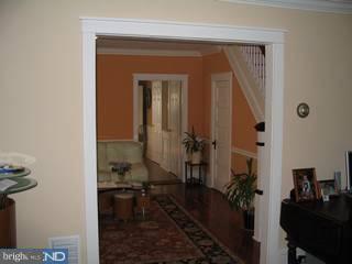 283 West Valley Road Wayne, PA 19087 - Photo 3 of 6 a hallway with a view of living room