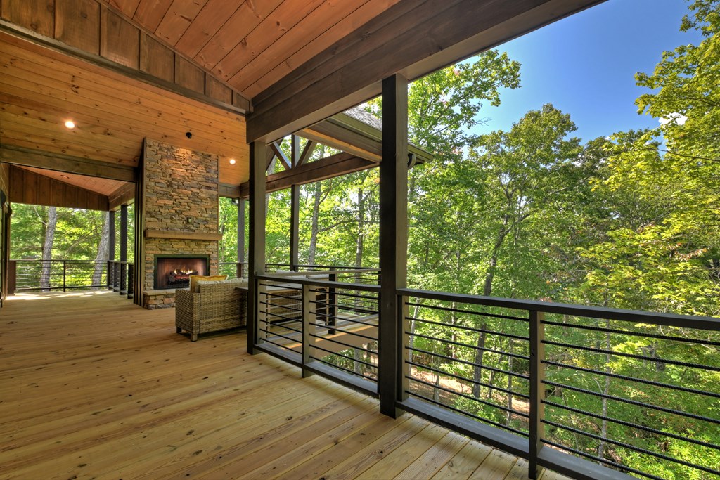 187 Chickadee Road Morganton, GA 30560 - Photo 15 of 94 a view of a porch with wooden floor and outdoor space