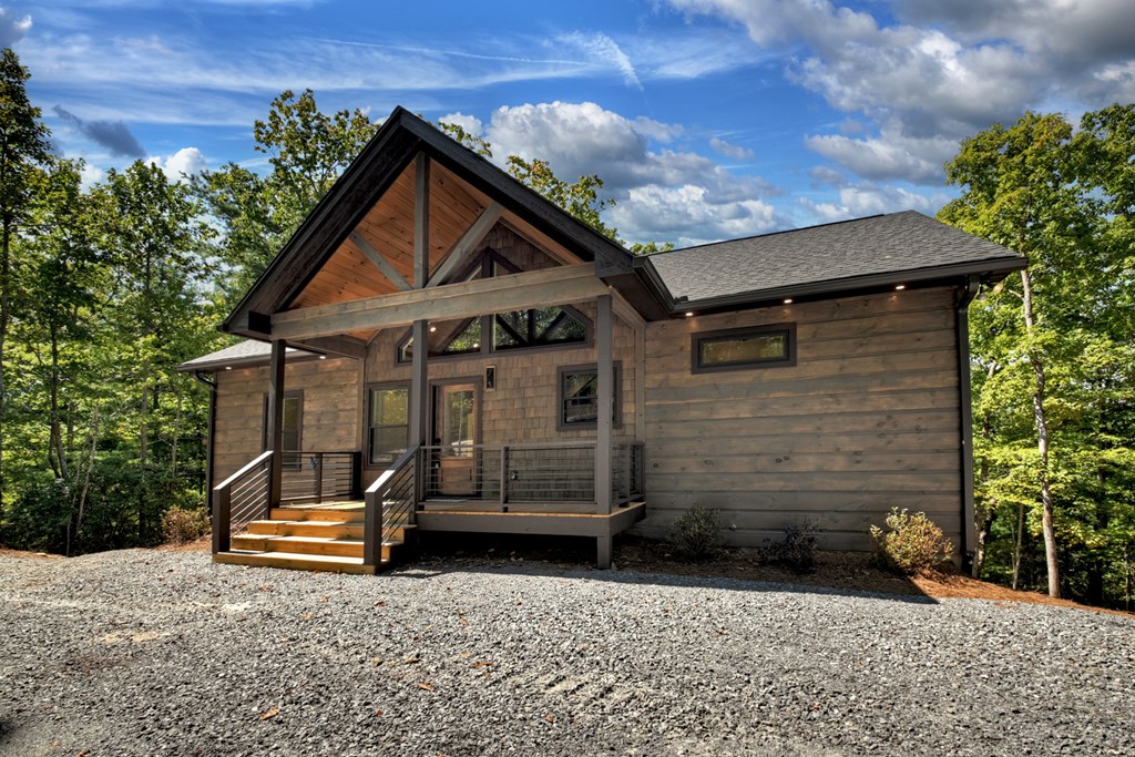 187 Chickadee Road Morganton, GA 30560 - Photo 56 of 94 a front view of a house with a yard