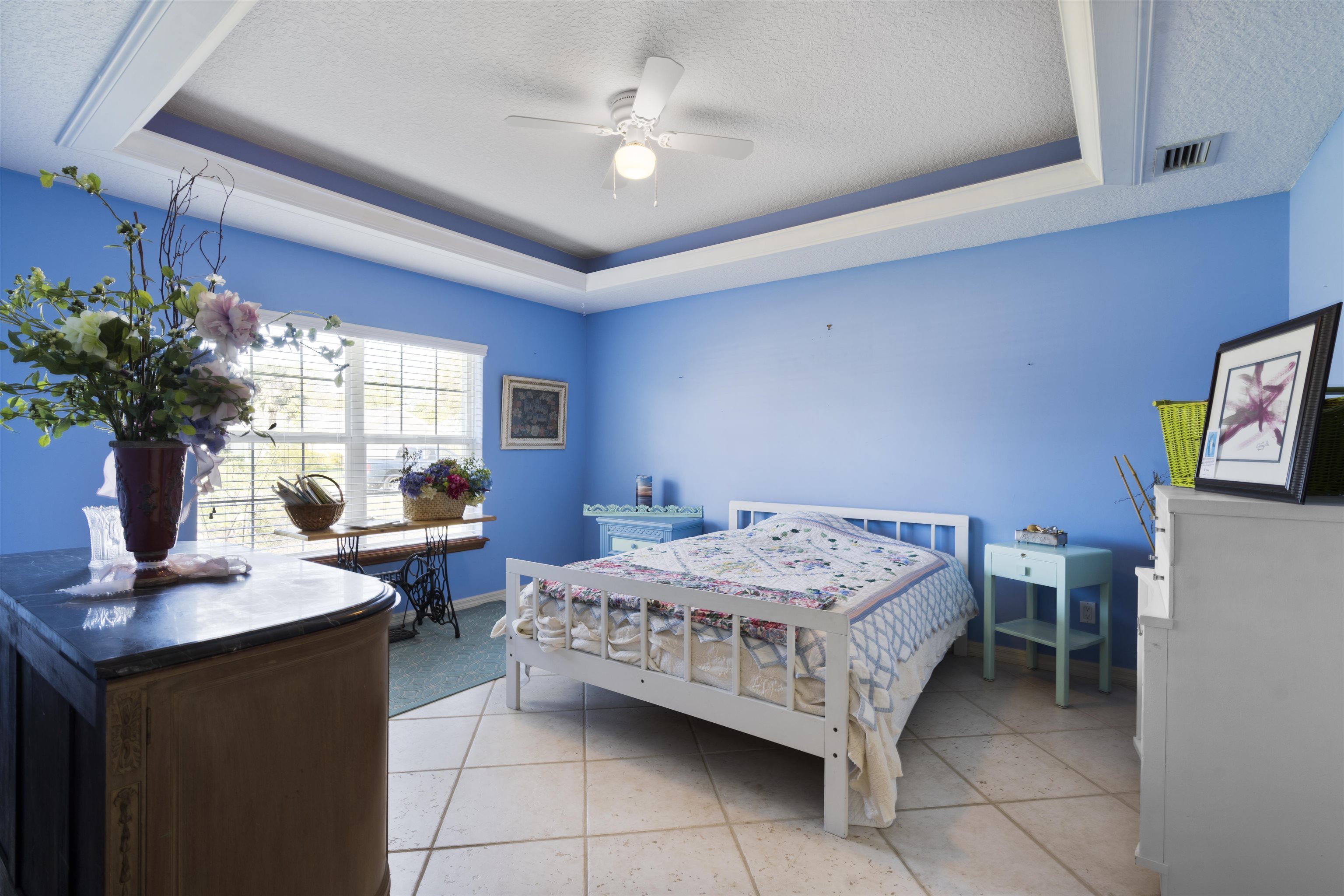 5372 5th Street St. Augustine, FL 32080 - Photo 23 of 46 a bedroom with a bed and a table in it