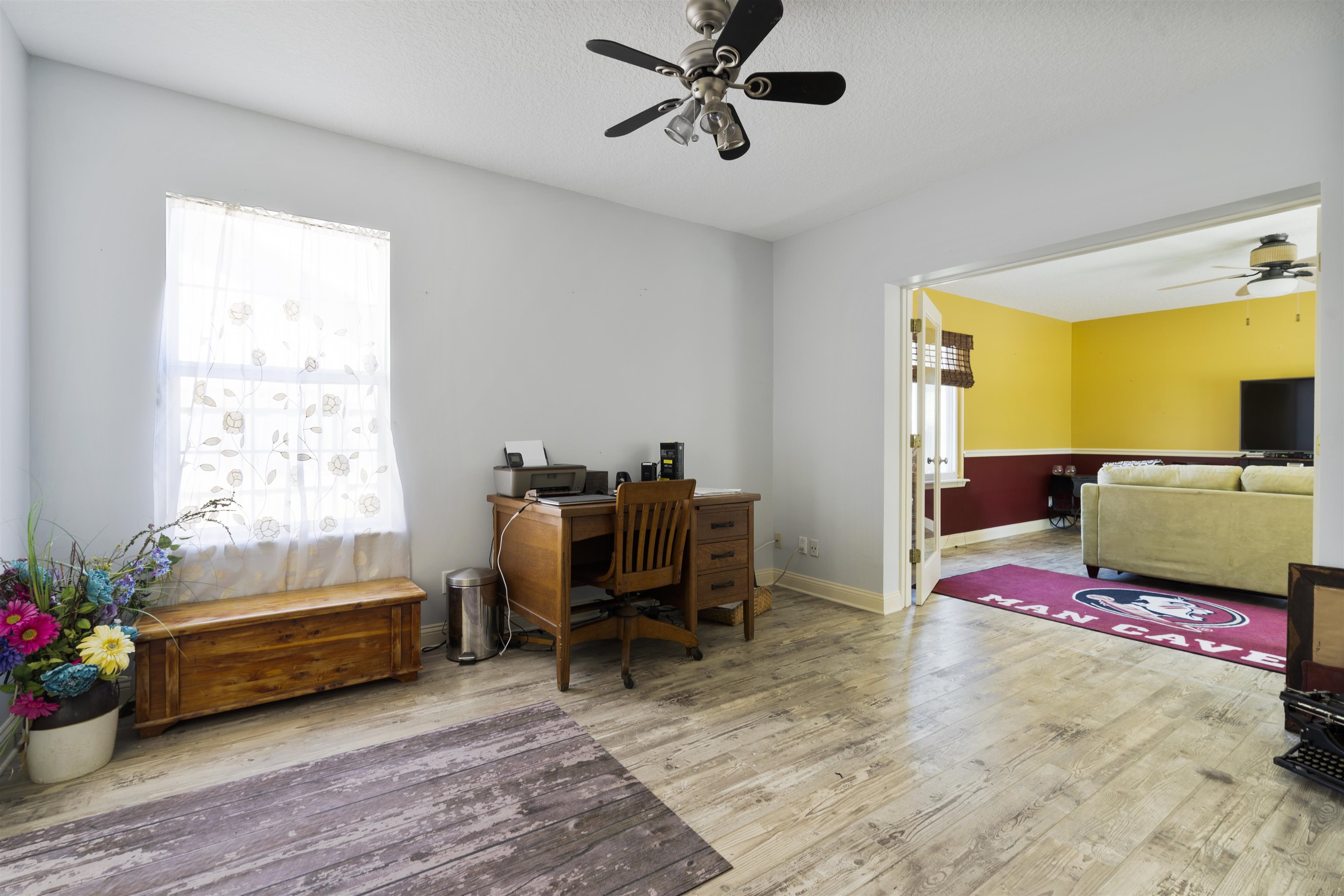 5372 5th Street St. Augustine, FL 32080 - Photo 28 of 46 a bedroom with a bed and a window
