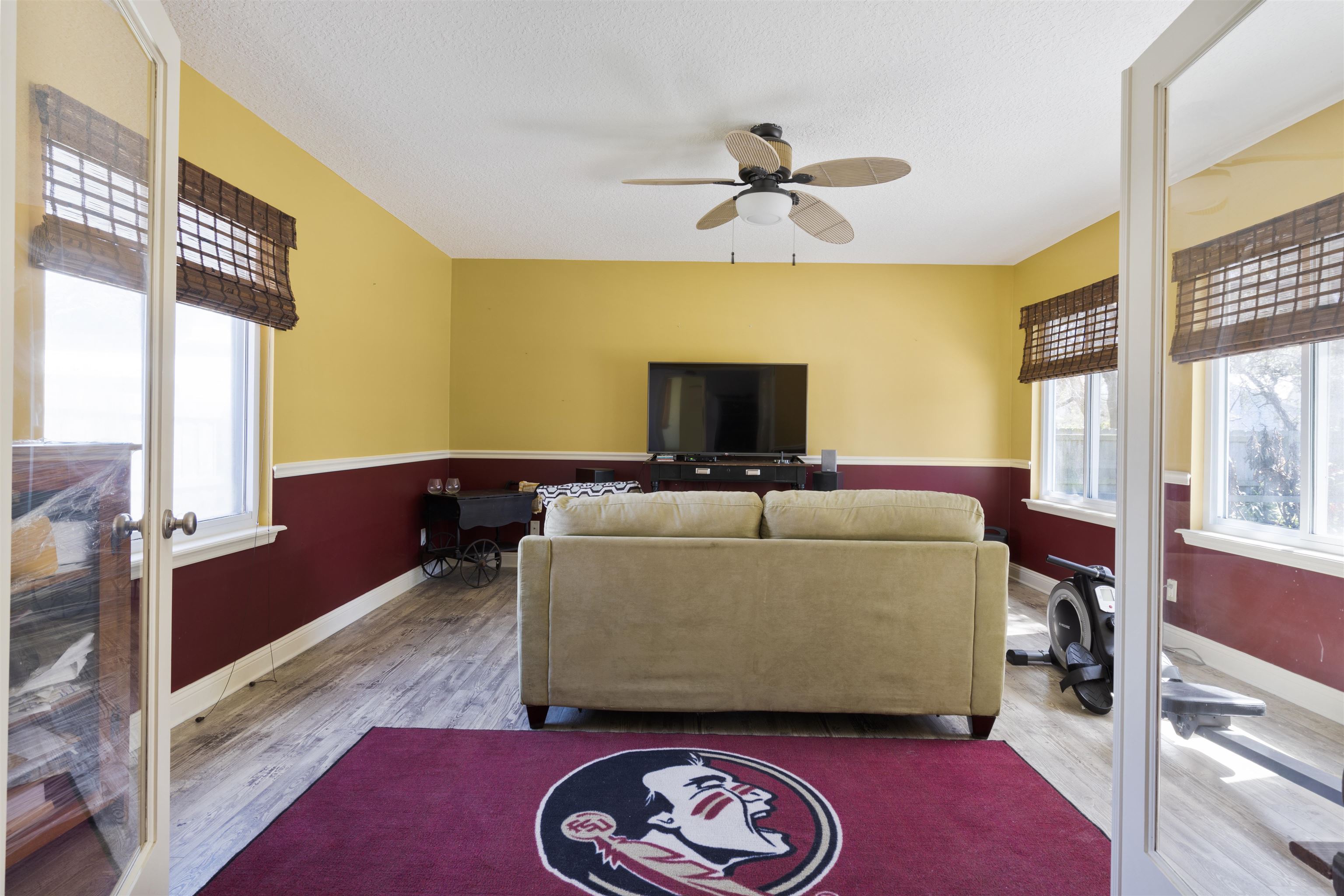 5372 5th Street St. Augustine, FL 32080 - Photo 30 of 46 a living room with furniture and a flat screen tv